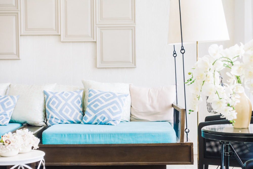 Bright pastel living room with soft cushions