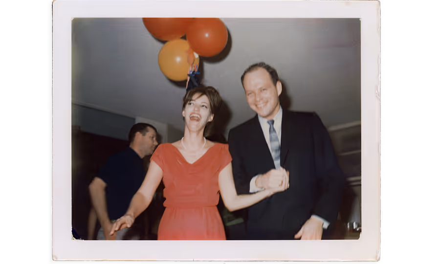 William & Fay O'Neil laughing at a celebration