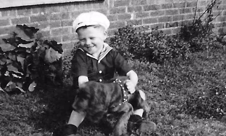 William J. O'Neil as a young child with his pet dog