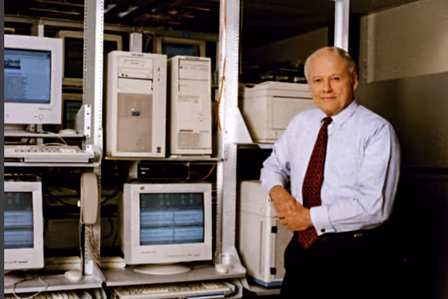 An image of William J. O'Neil standing in the data center.