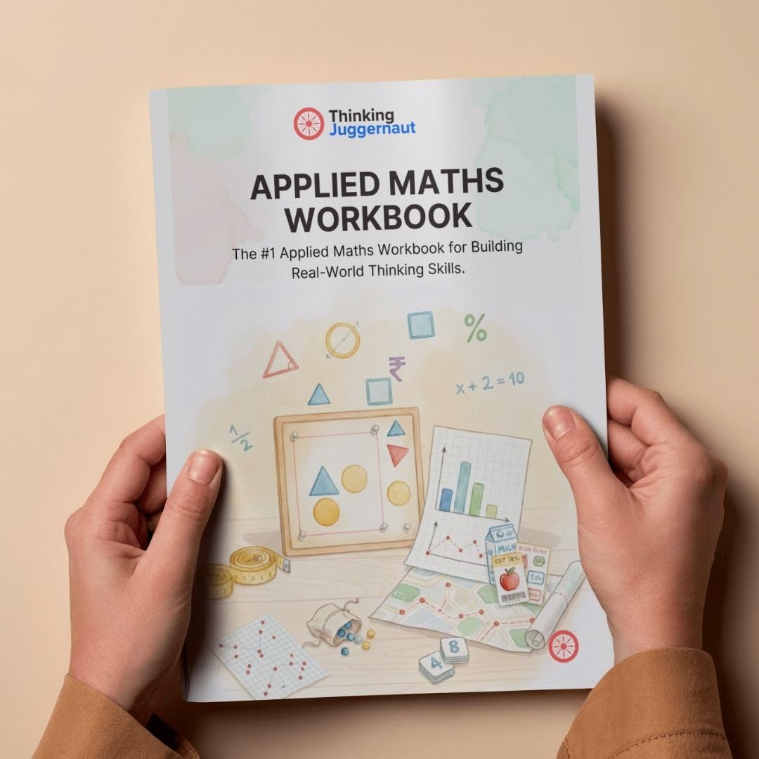 Hands holding an Applied Maths Workbook by Thinking Juggernaut, featuring math symbols, shapes, charts, and a map illustration on the cover.