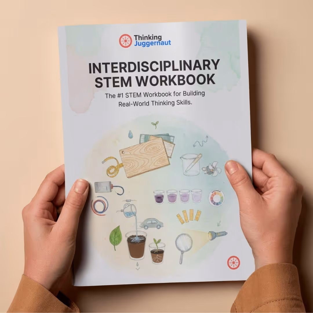 Hands holding the Interdisciplinary STEM Workbook by Thinking Juggernaut, showing illustrations of science and engineering tools and experiments.