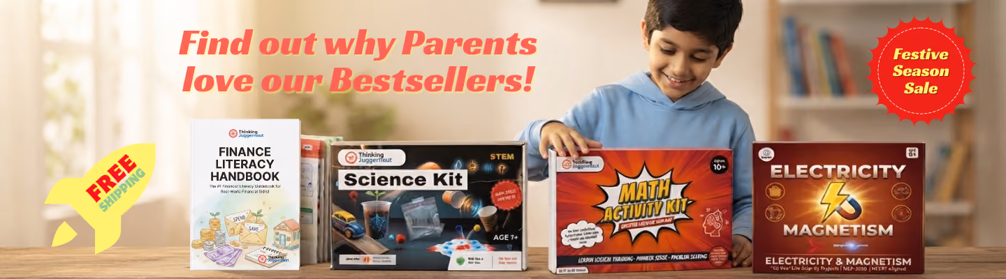 Banner with a smiling boy in a blue hoodie sitting at a wooden table with four educational products: Finance Literacy Handbook, Science Kit, Math Activity Kit, and Electricity & Magnetism kit, with promotional texts 'Find out why Parents love our Bestsellers!', 'FREE Shipping' in a yellow rocket icon, and 'Festive Season Sale' in a red burst shape.