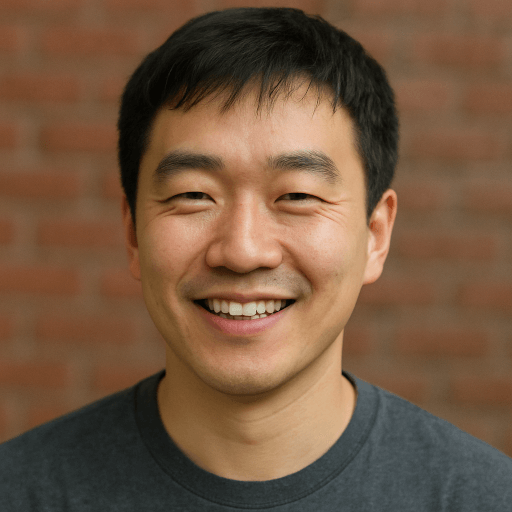 Uploaded selfie of a man smiling in front of a brick wall for generating professional AI headshots