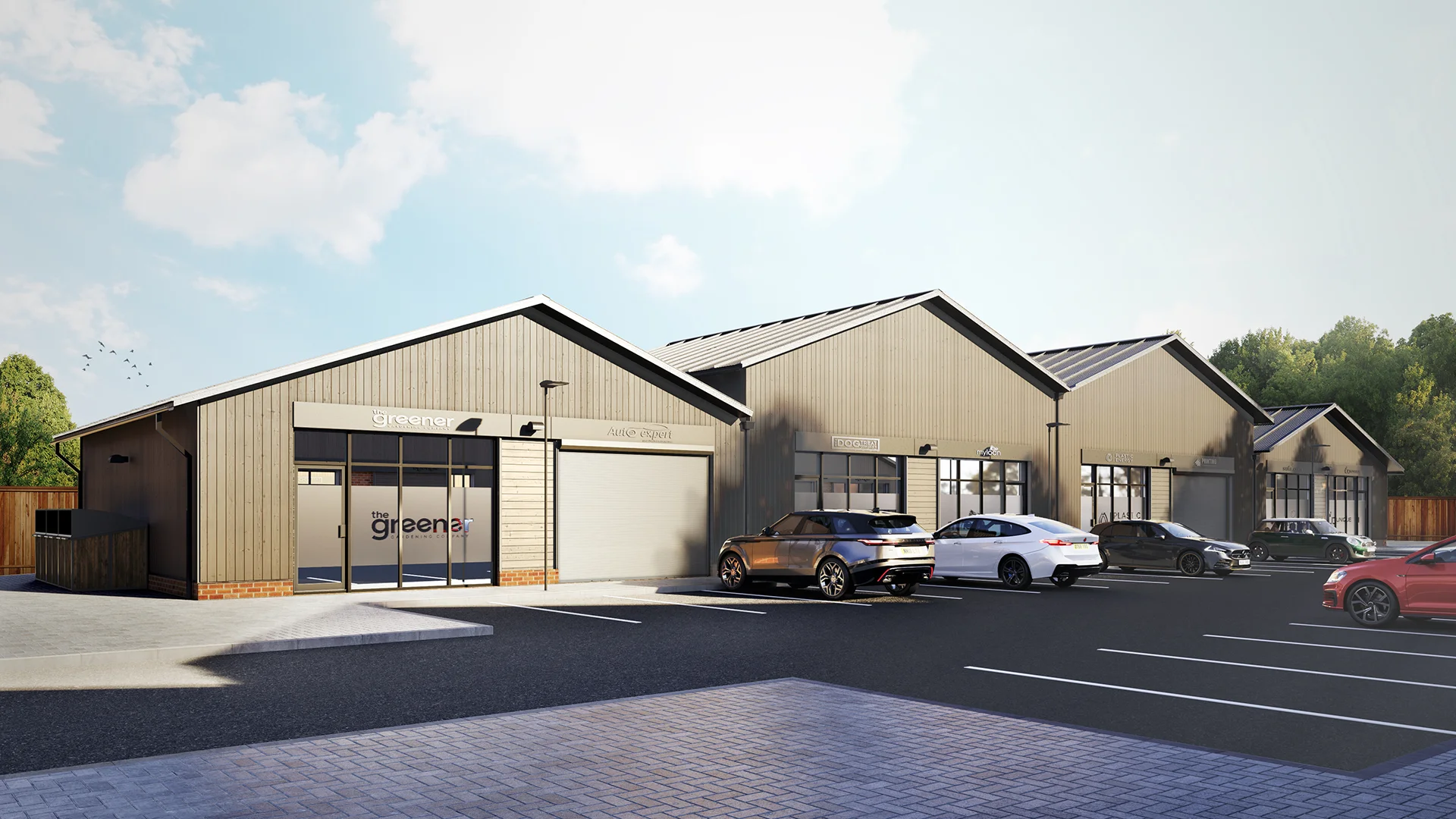 The Greener commercial retail development with modern warehouse-style units and customer parking