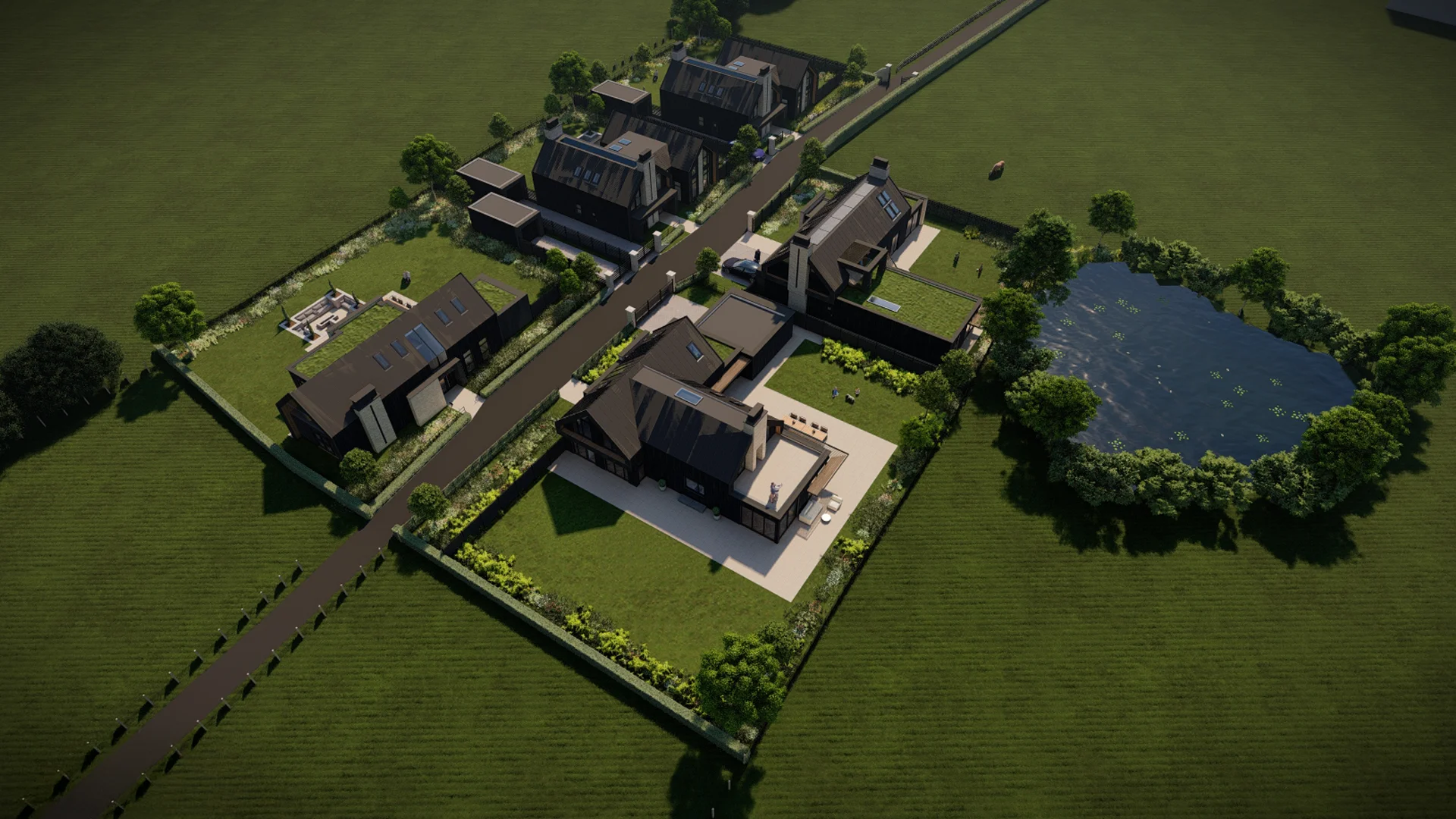Residential housing development aerial view showing modern detached homes with private gardens and pond feature