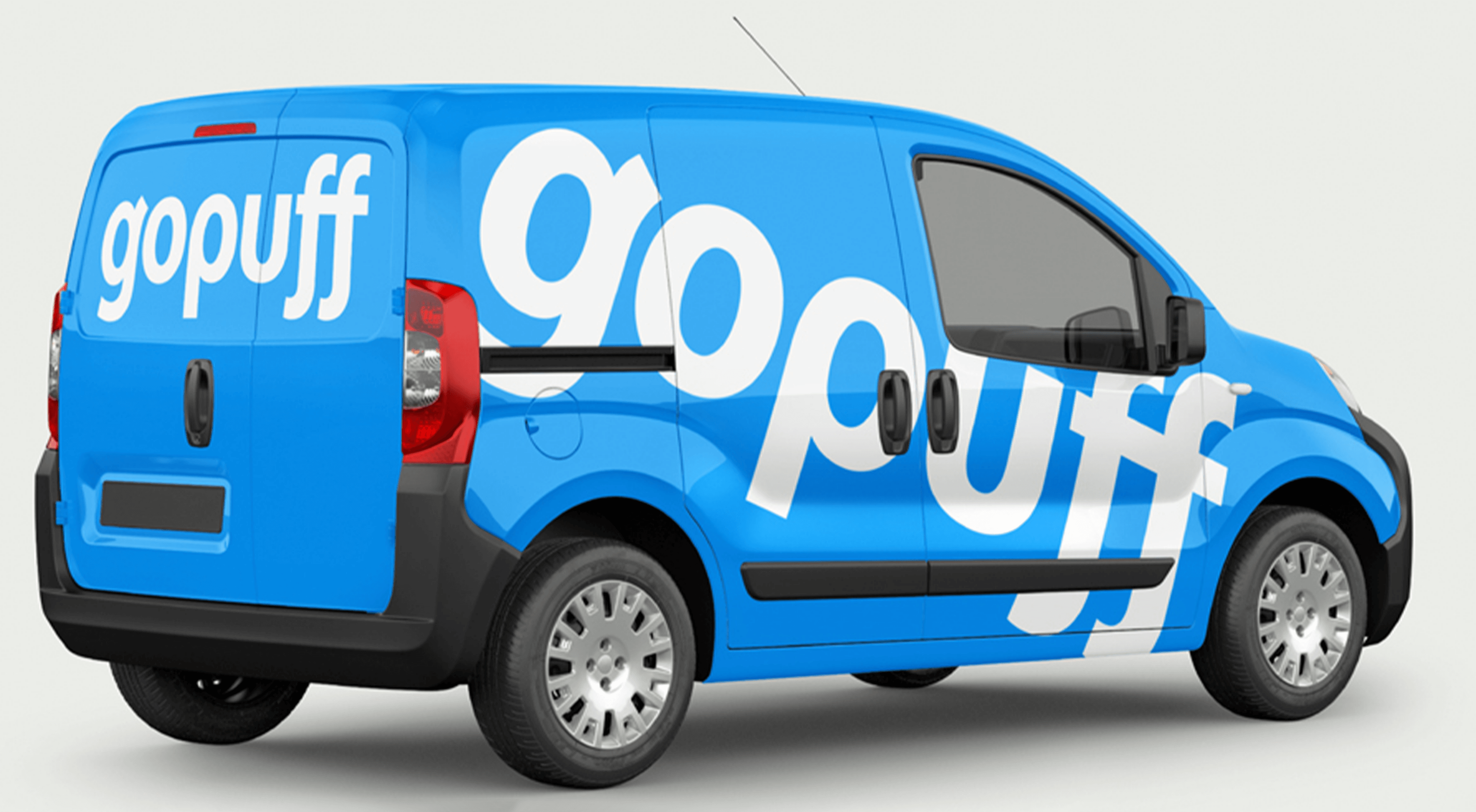 passenger van with blue wrap and gopuff logo