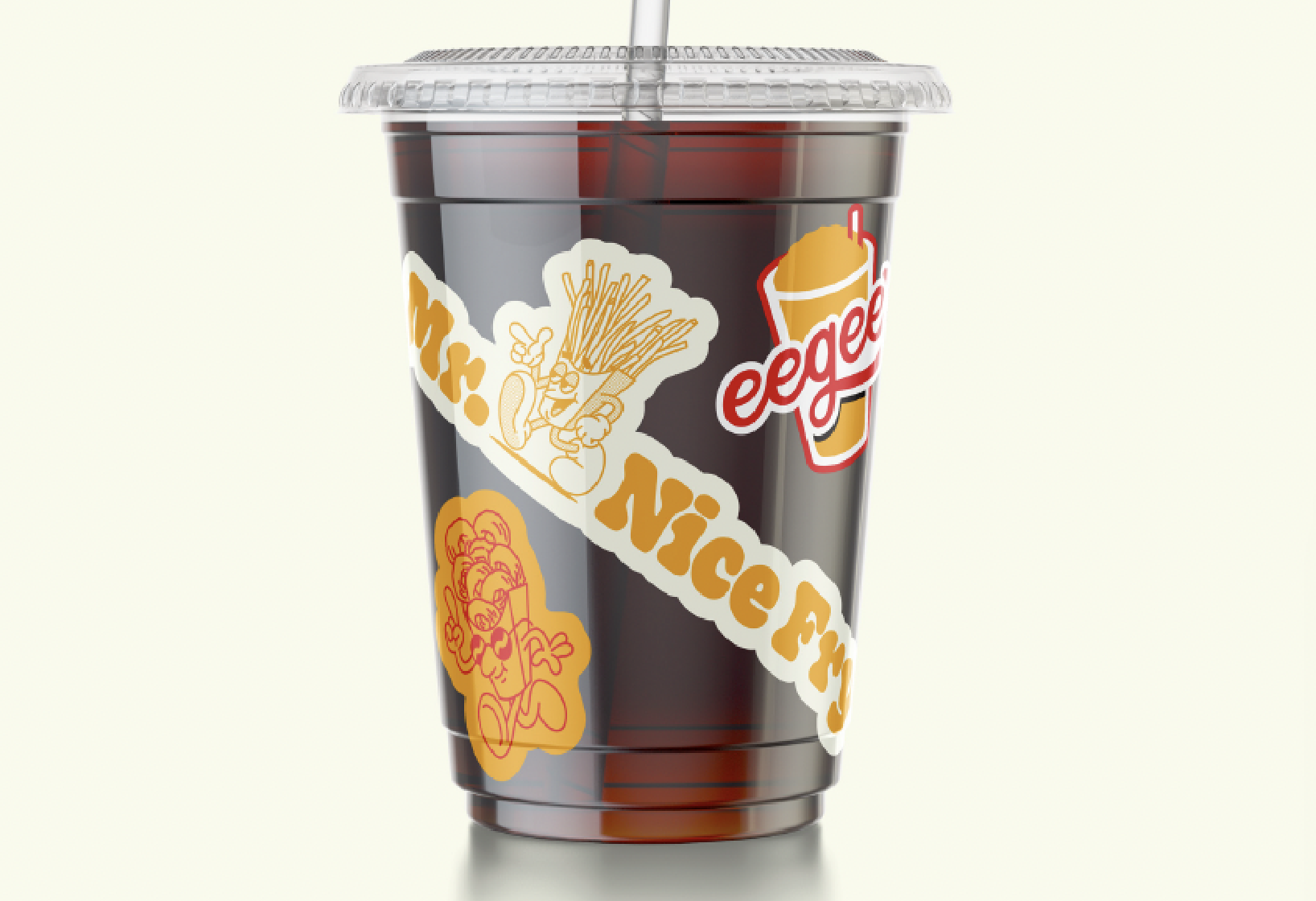 Clear plastic cup containing soda with Snackville logos