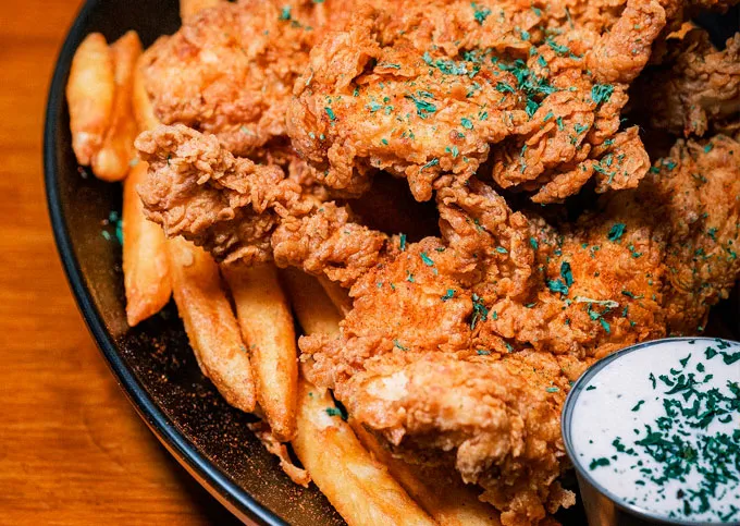 Crispy fish tenders with blue cheese sauce