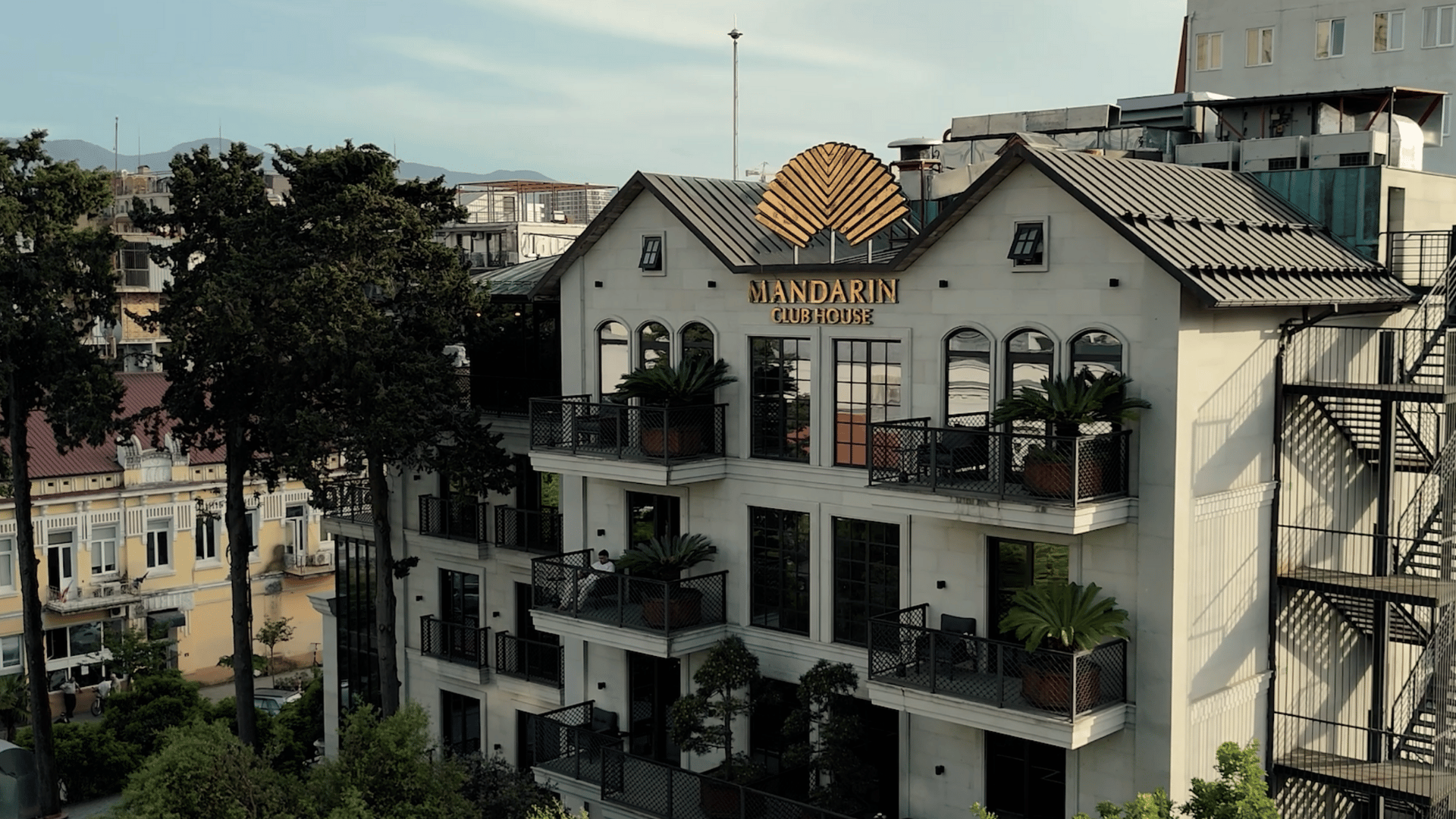 Hotel Mandarin Club House building from top view, drone view. Beautiful boutique hotel in Batumi.