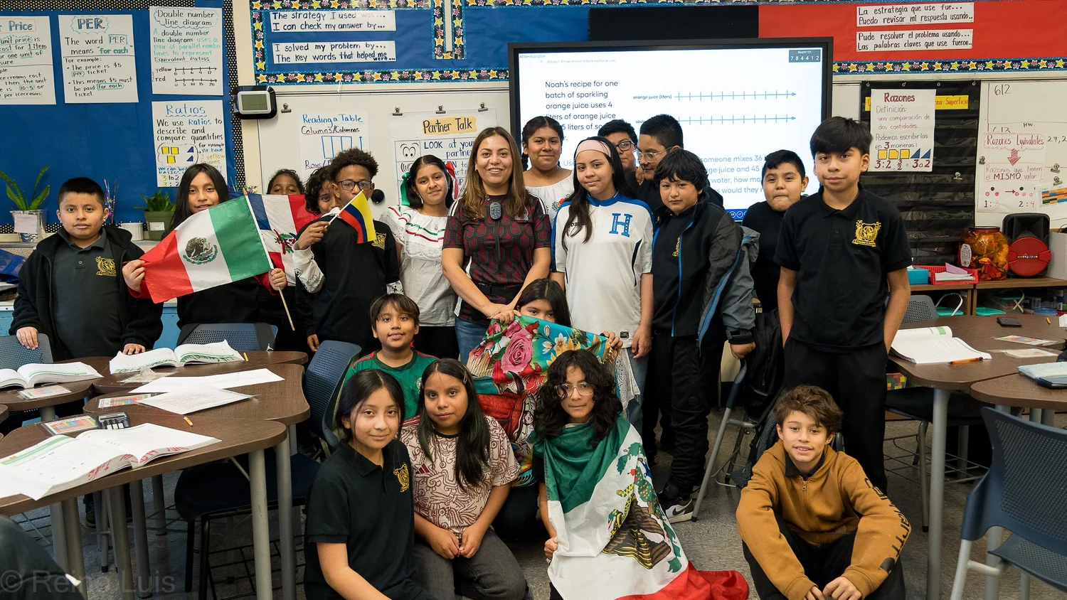 Students and teacher celebrating Hispanic Heritage Month in math classroom