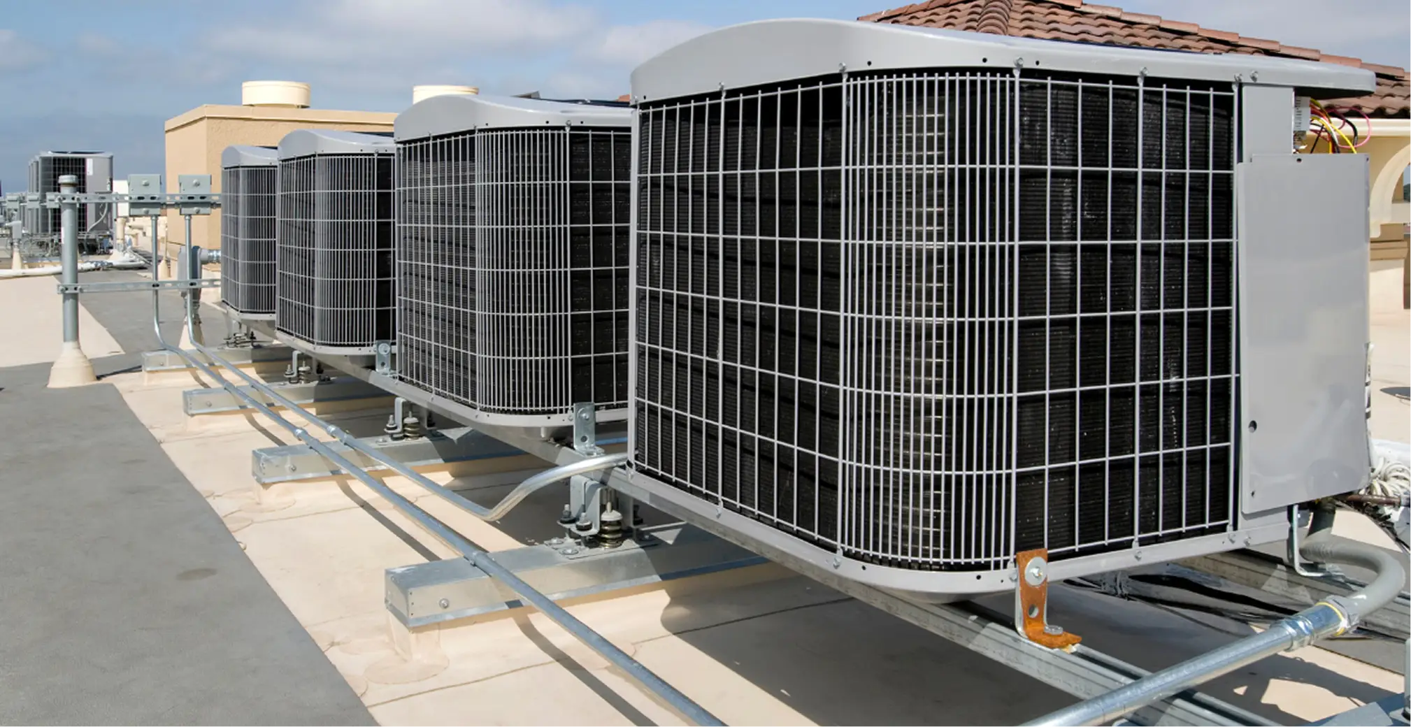 Row of rooftop VRV outdoor condenser units for a commercial building