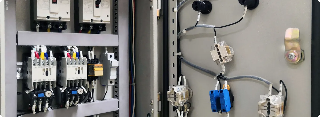  Open electrical panel showing breakers and wiring.