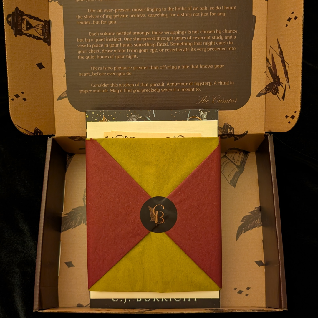 The Curator's Bazaar's Fantasy box opened to display a wrapped book, a sealed letter, stationary for drinks and music, and small perfume card
