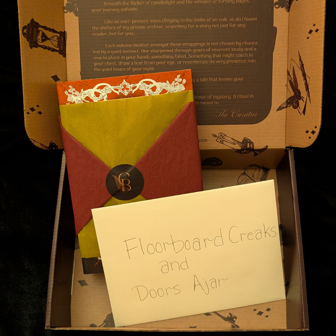 The Curator's Bazaar's Horror box opened to display a wrapped book, a sealed letter, stationary for drinks and music, and small perfume card