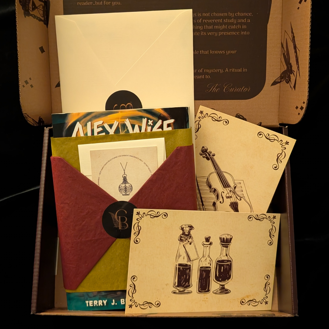 The Curator's Bazaar's Young Adult box opened to display a wrapped book, a sealed letter, stationary for drinks and music, and small perfume card