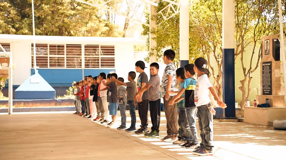 Kids in line smiling