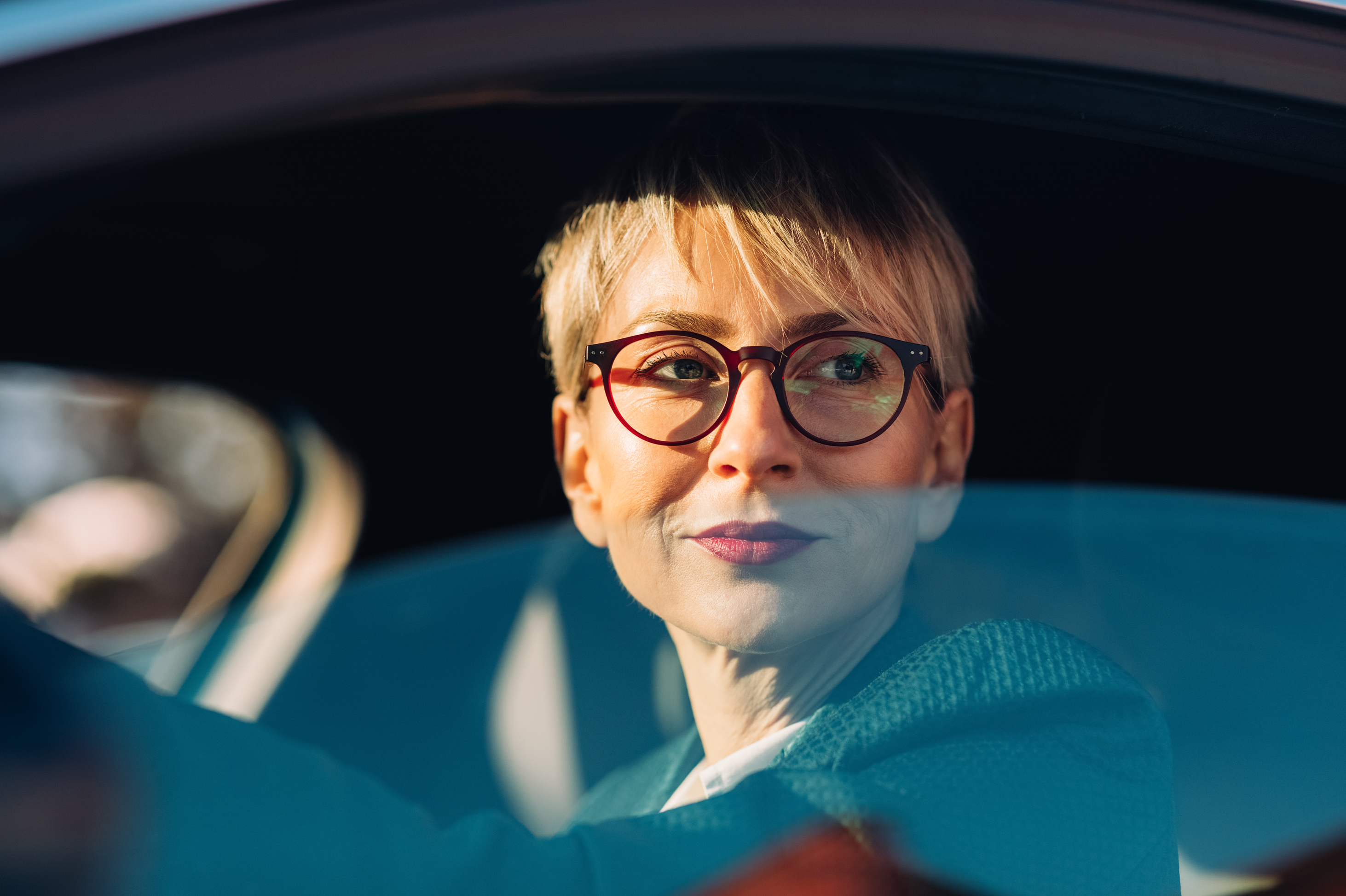 Woman sitting in car
