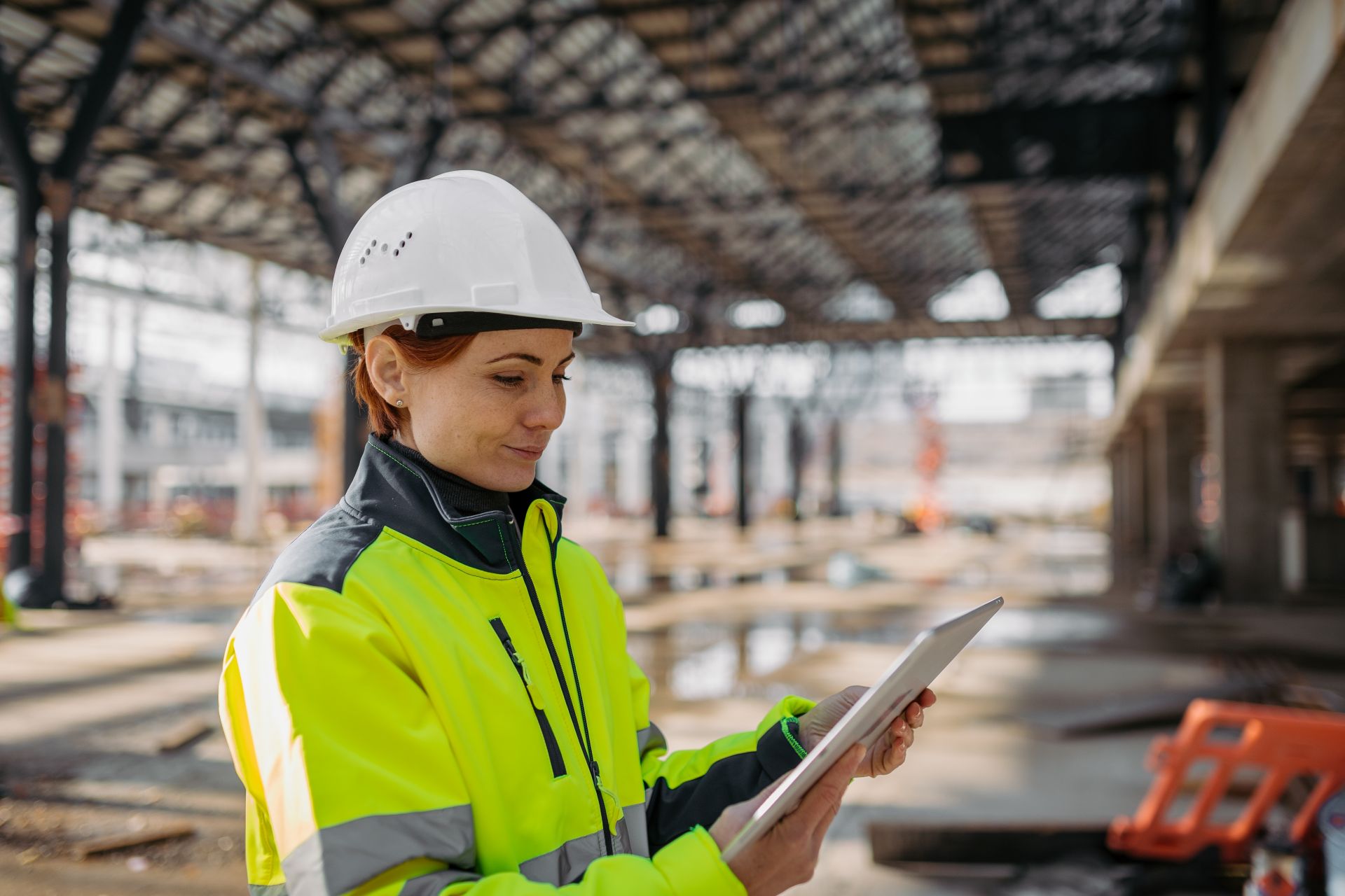 Contractor reviewing insurance documents on-site