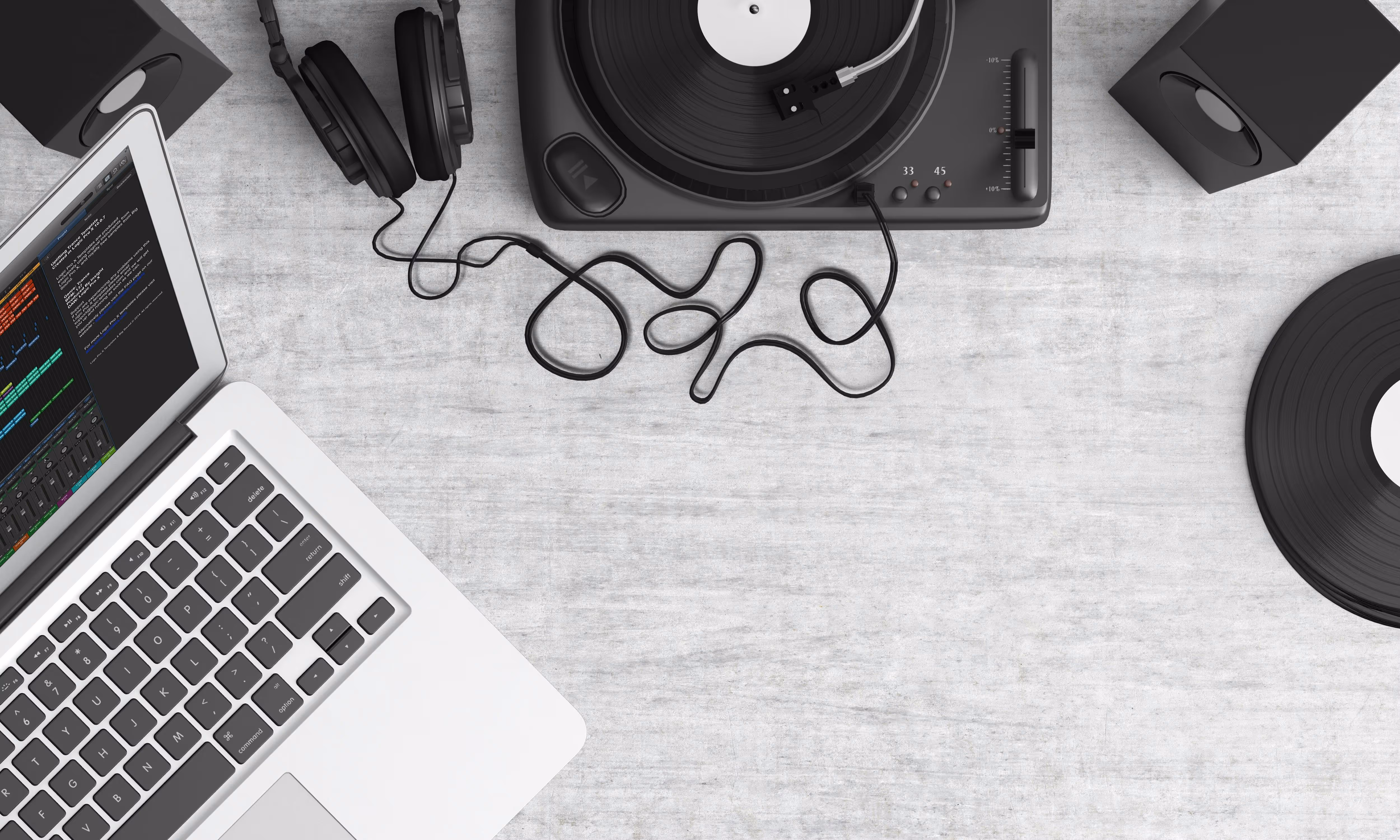 an image of a laptop, record player, and some accessories