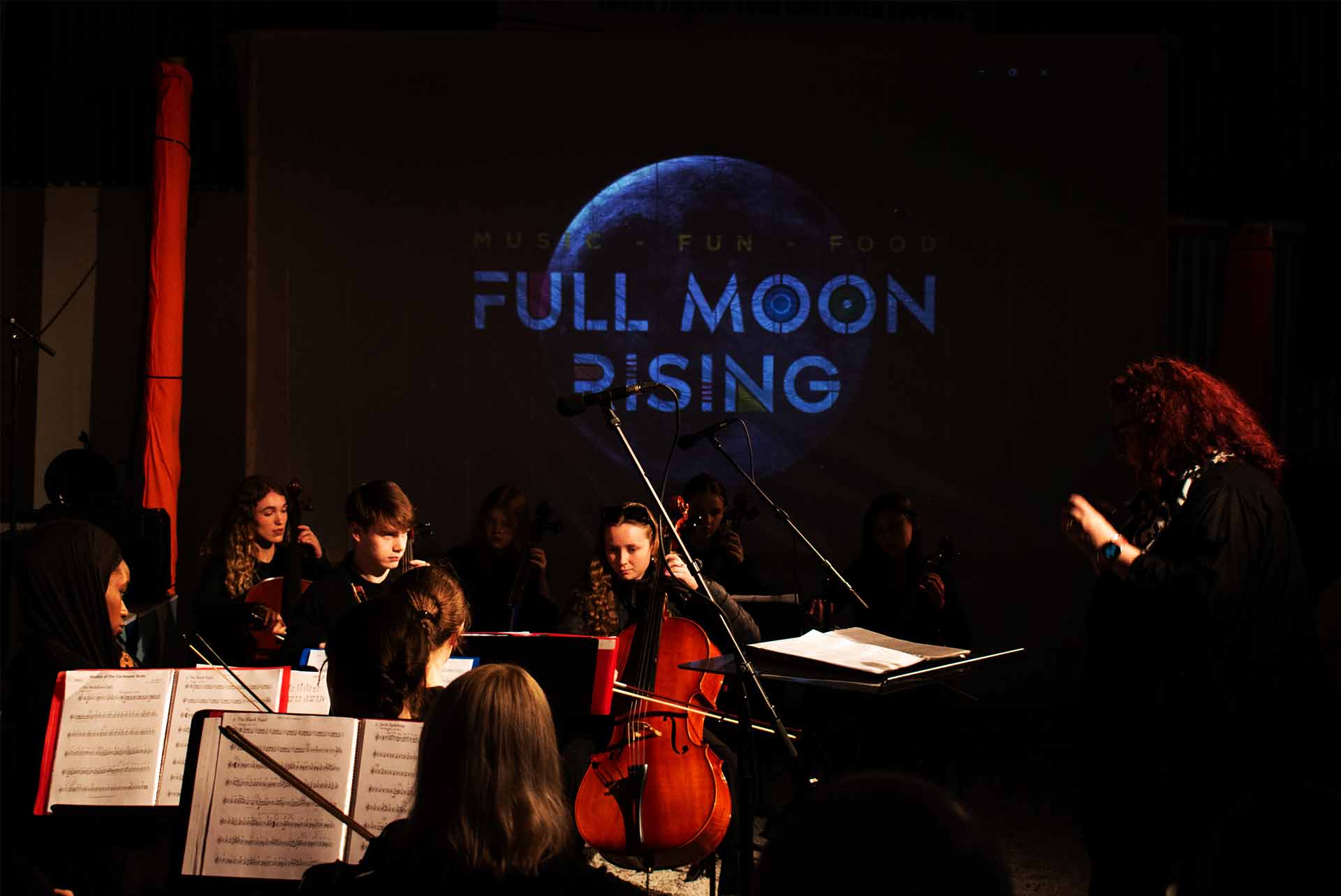 Live Classical music being played by young artist musicians at Full Moon Rising Festival