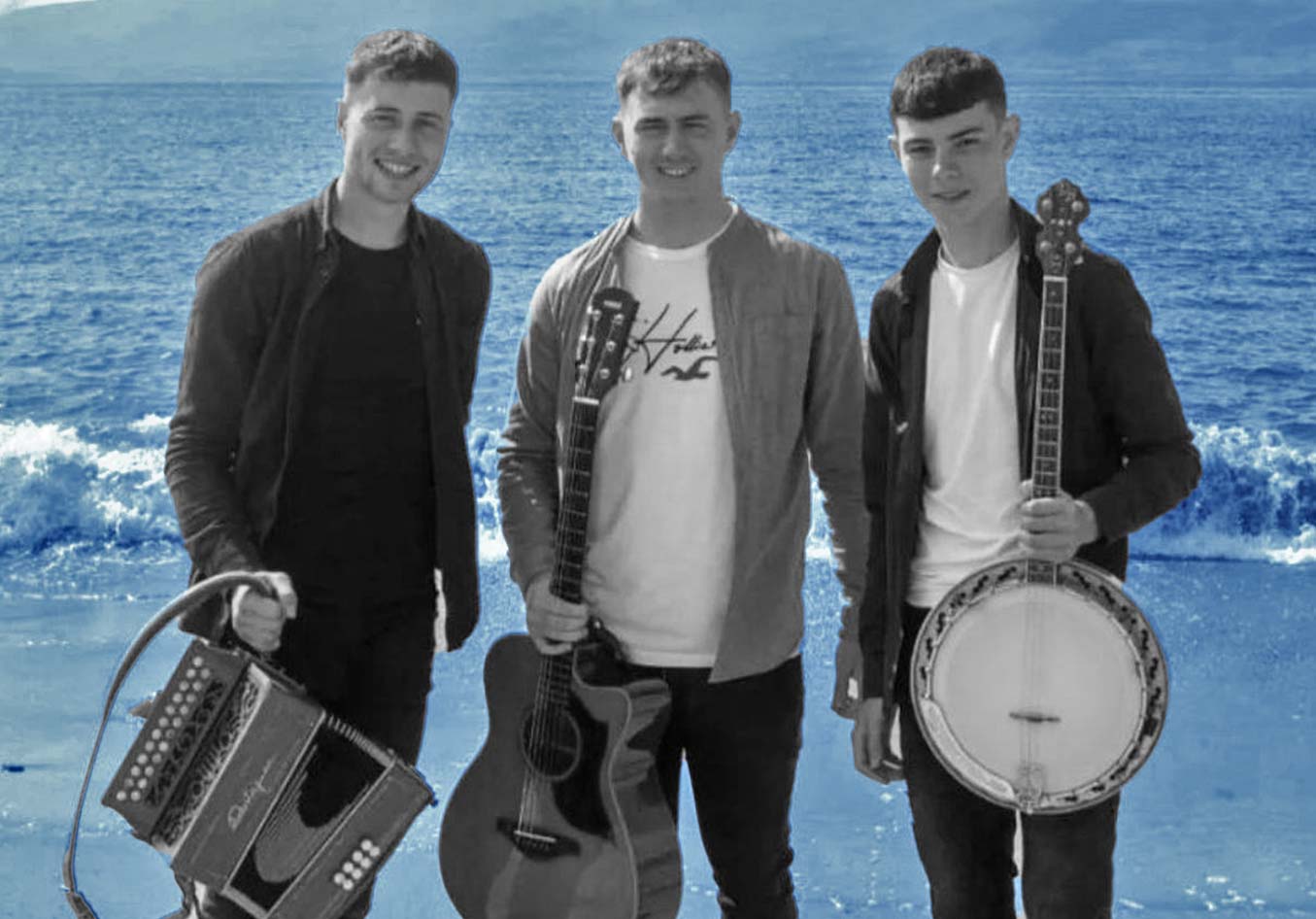 HighTide - Tadhg Scanlon on banjo, Michael Scanlon on box, and the charismatic William Goodwin leading with guitar and vocals. Posing on beach front.