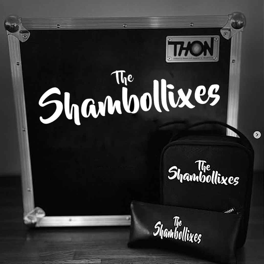 Black equipment case, bag, and pouch all labeled with the text 'The Shambollixes' in white font.