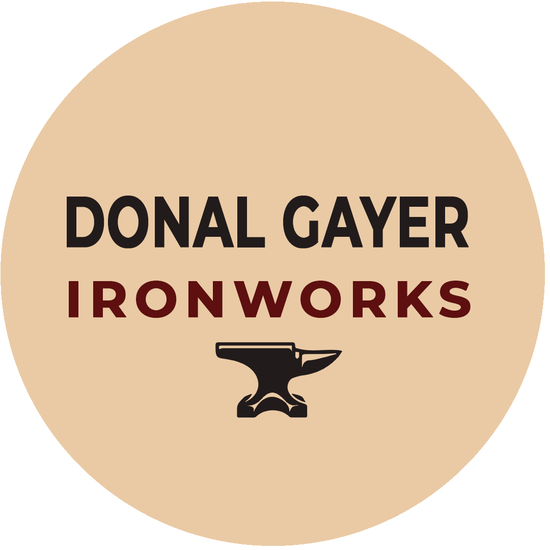 Logo with text Donal Gayer Ironworks above a black anvil icon on a beige circular background.
