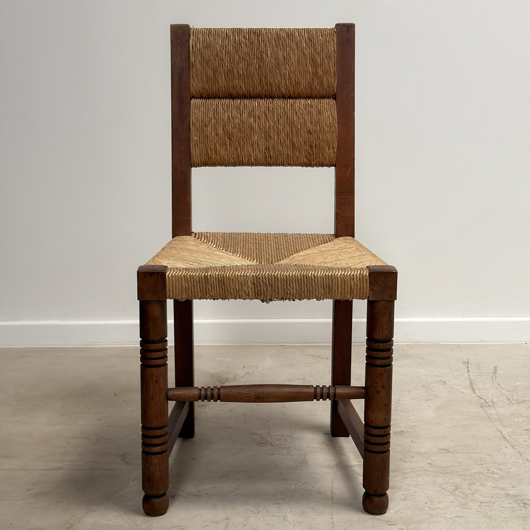 Six Mid-Century Oak Dining Chairs with Rush Seats