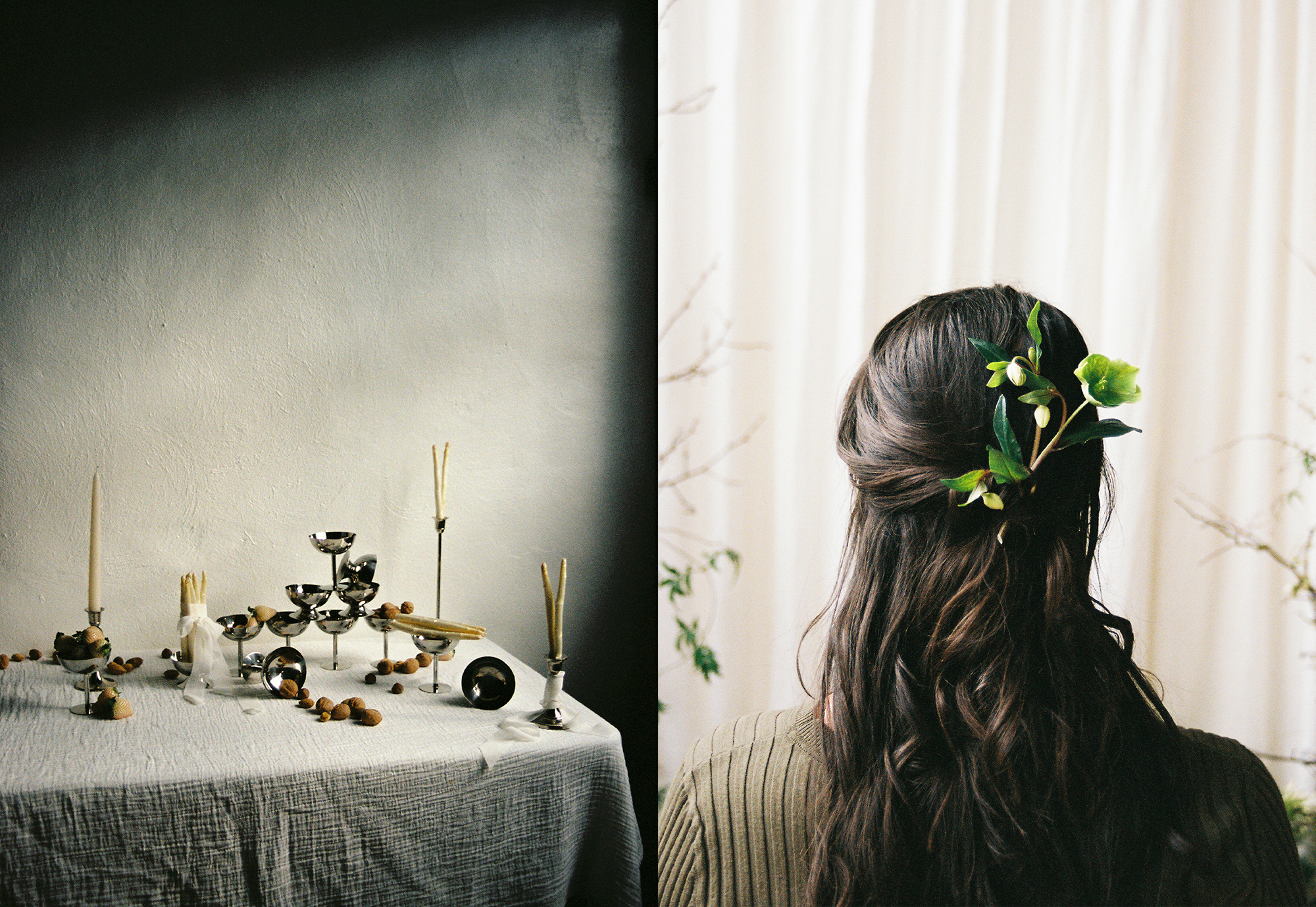 Minimalist wedding table with sculptural candlesticks – Still life of candles, nuts, and silver vessels; bride’s hair adorned with green floral accent.