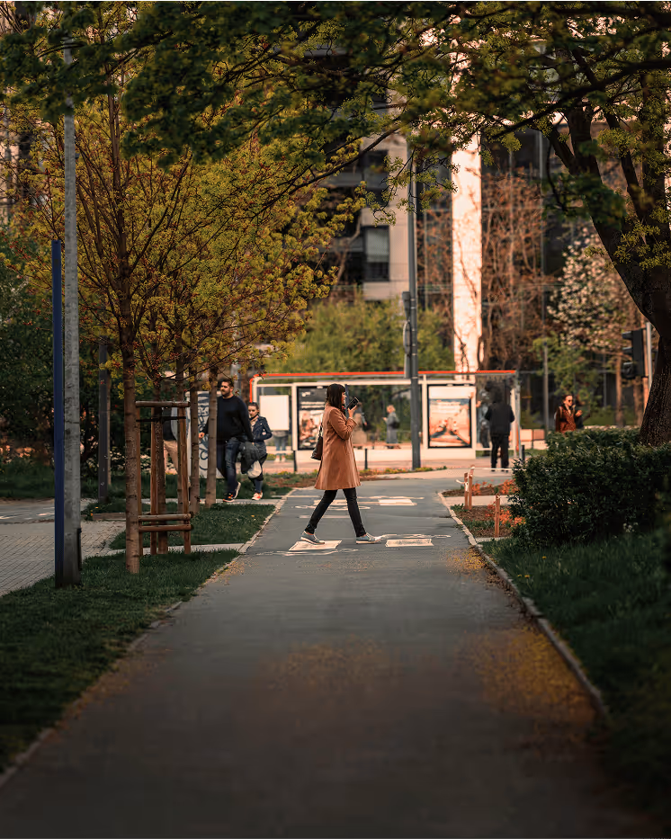 Woman walking through a city street in Canada, symbolizing career journeys, transitions, and the path to self-awareness and growth.