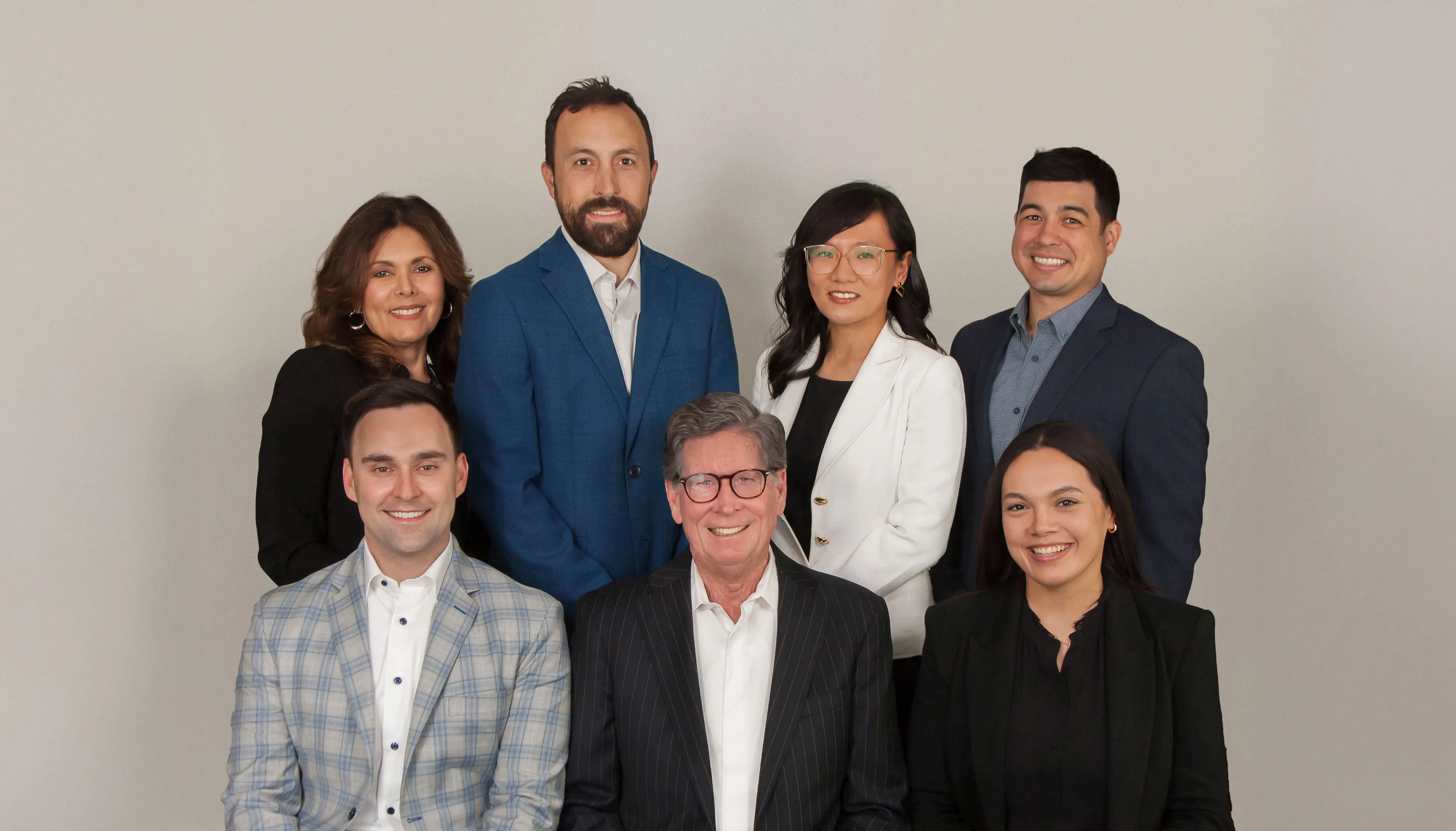 Ducere team members standing next to each other.