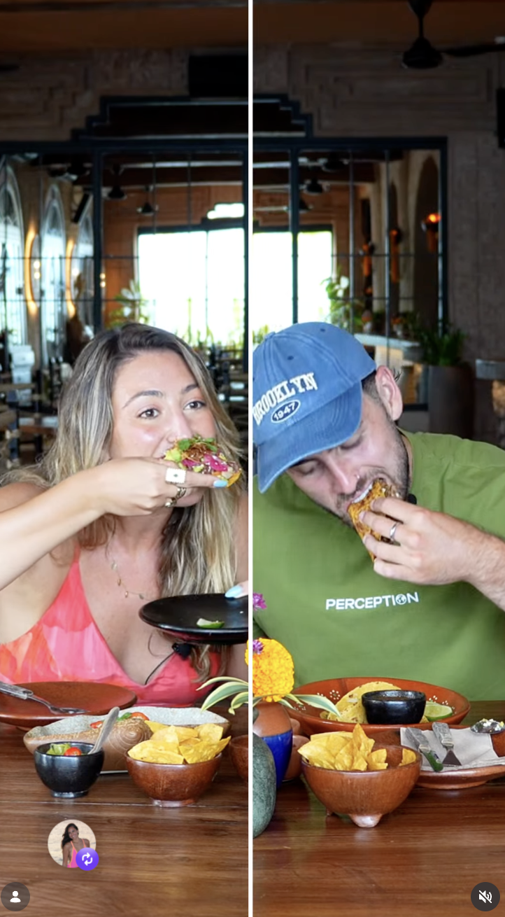 Two diners tasting tacos side by side in Origen's dining room