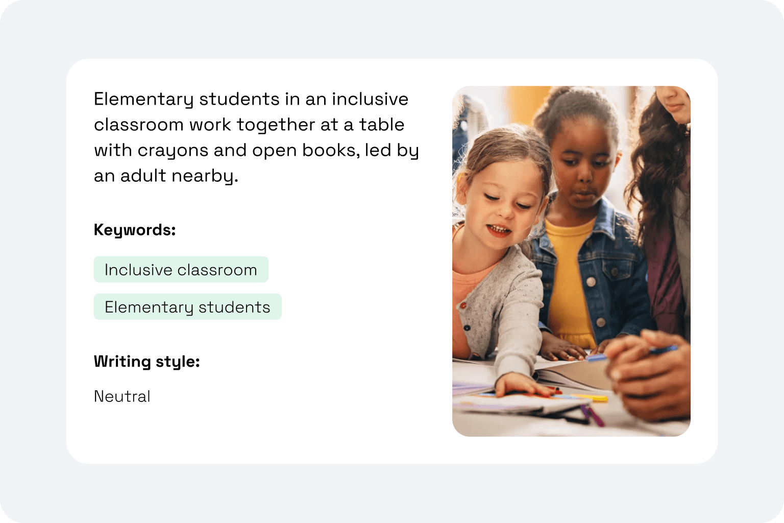 Elementary students at a table with crayons and open books in an inclusive classroom.