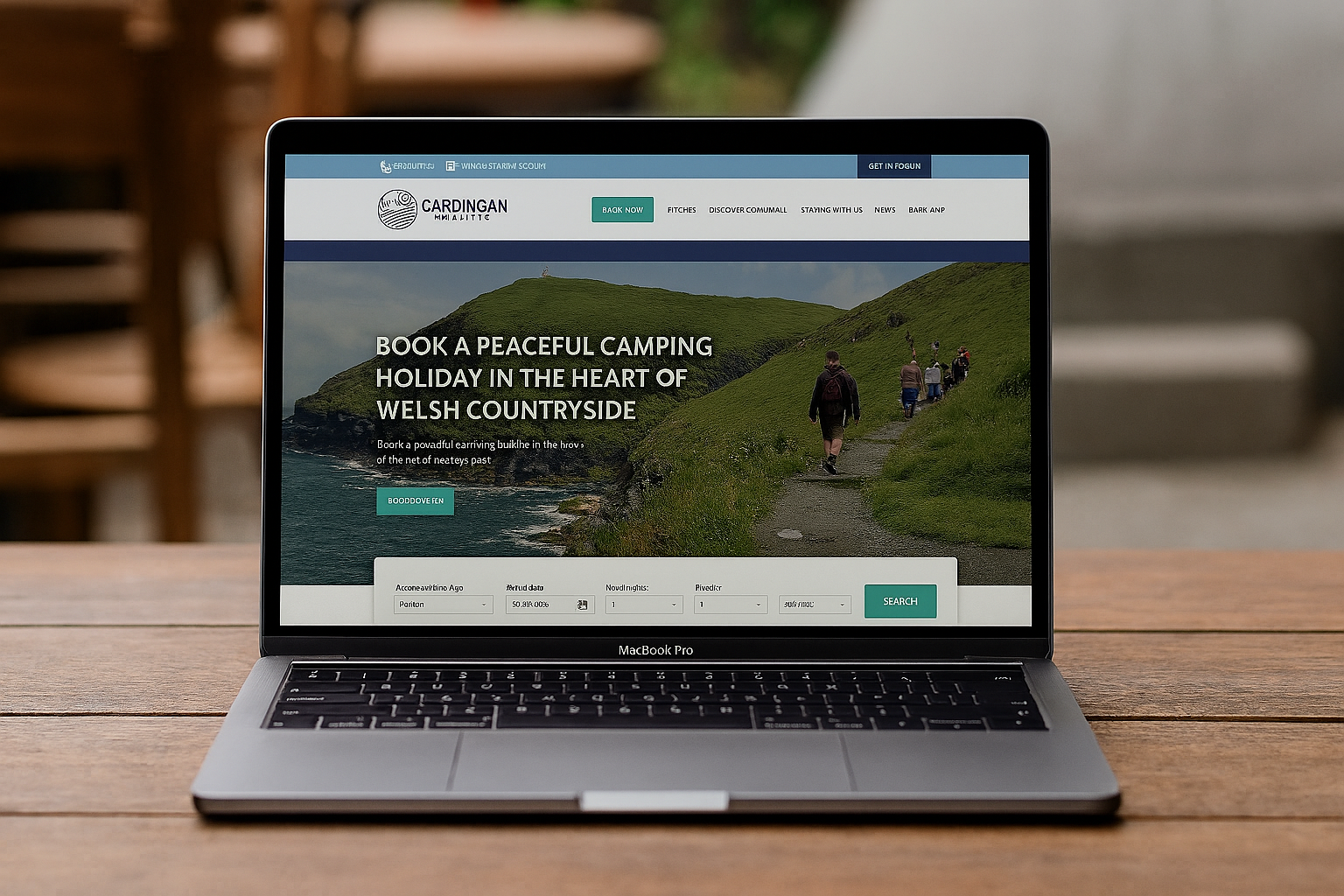 Open laptop displaying a campsite booking website for a Welsh holiday park, illustrating modern web design for tourism businesses.
