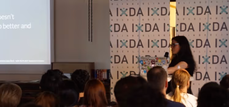 Tamara presenting at IxDA Berlin. Photo by Konrad Röpke.