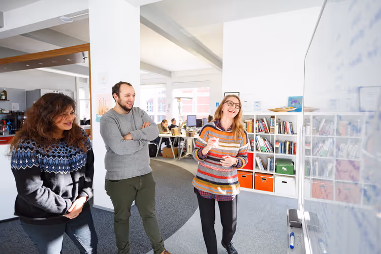Having fun at the whiteboard – naturally. ;)