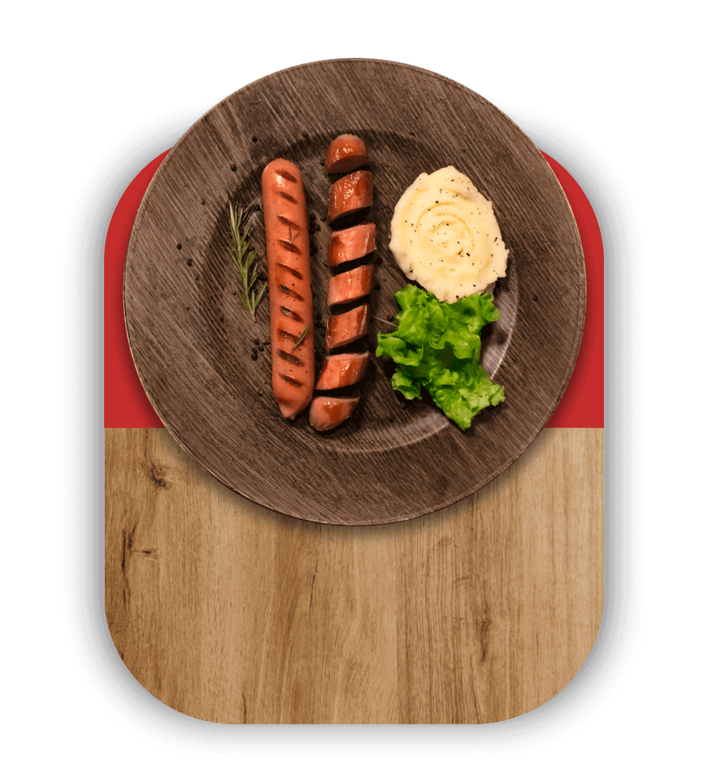 Plato con 2 salchichas asadas a la parrilla acompañadas de un puré de papa