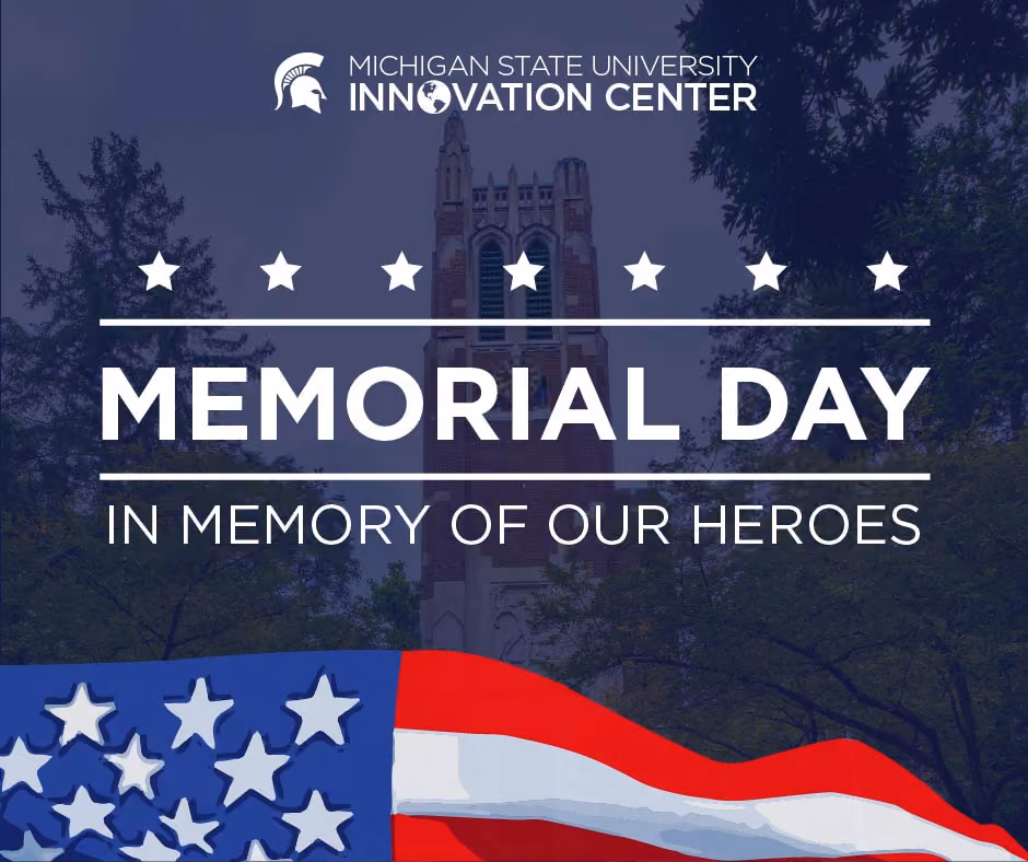 Michigan State University Innovation Center Memorial Day "In Memory of our Heros"  text with american flag