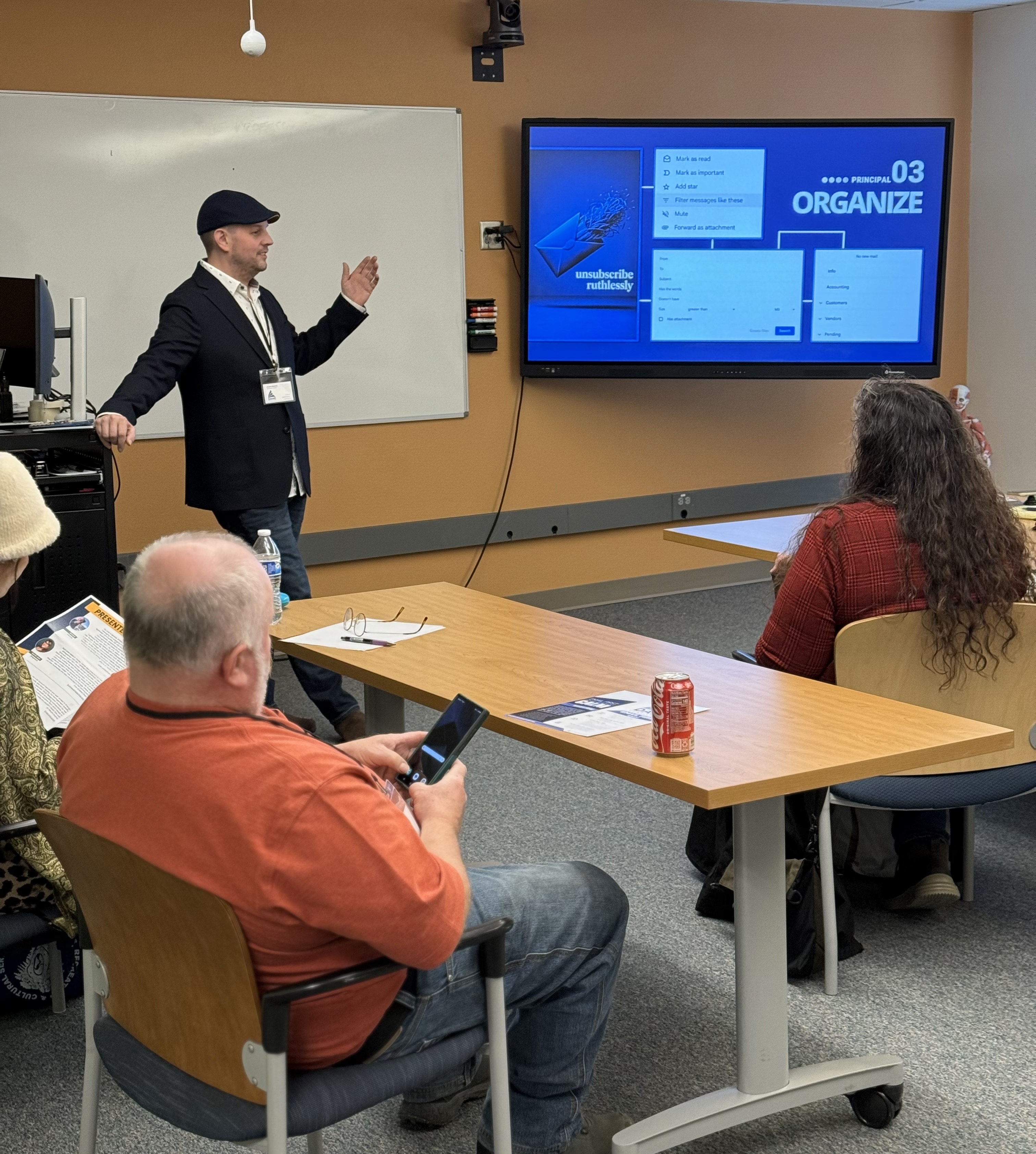 Logan Cressler of Dane Consult presenting Email First, Dane Consults signature system for managing small business administration