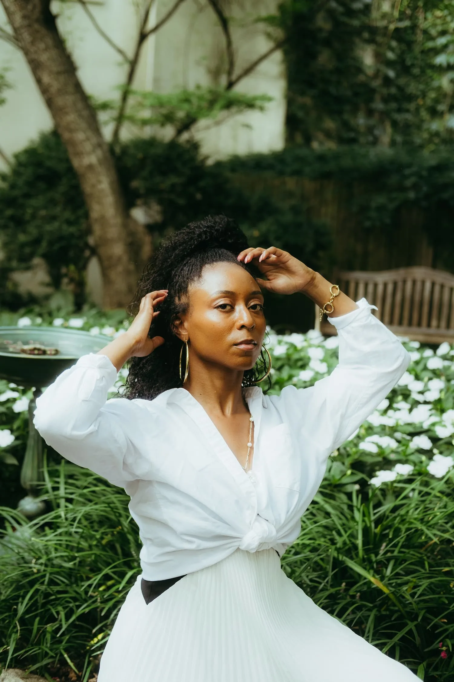 Branden Janese in white among flowers