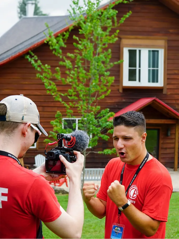 Australian student learning photography skills at AmeriCamp summer camp in the USA.