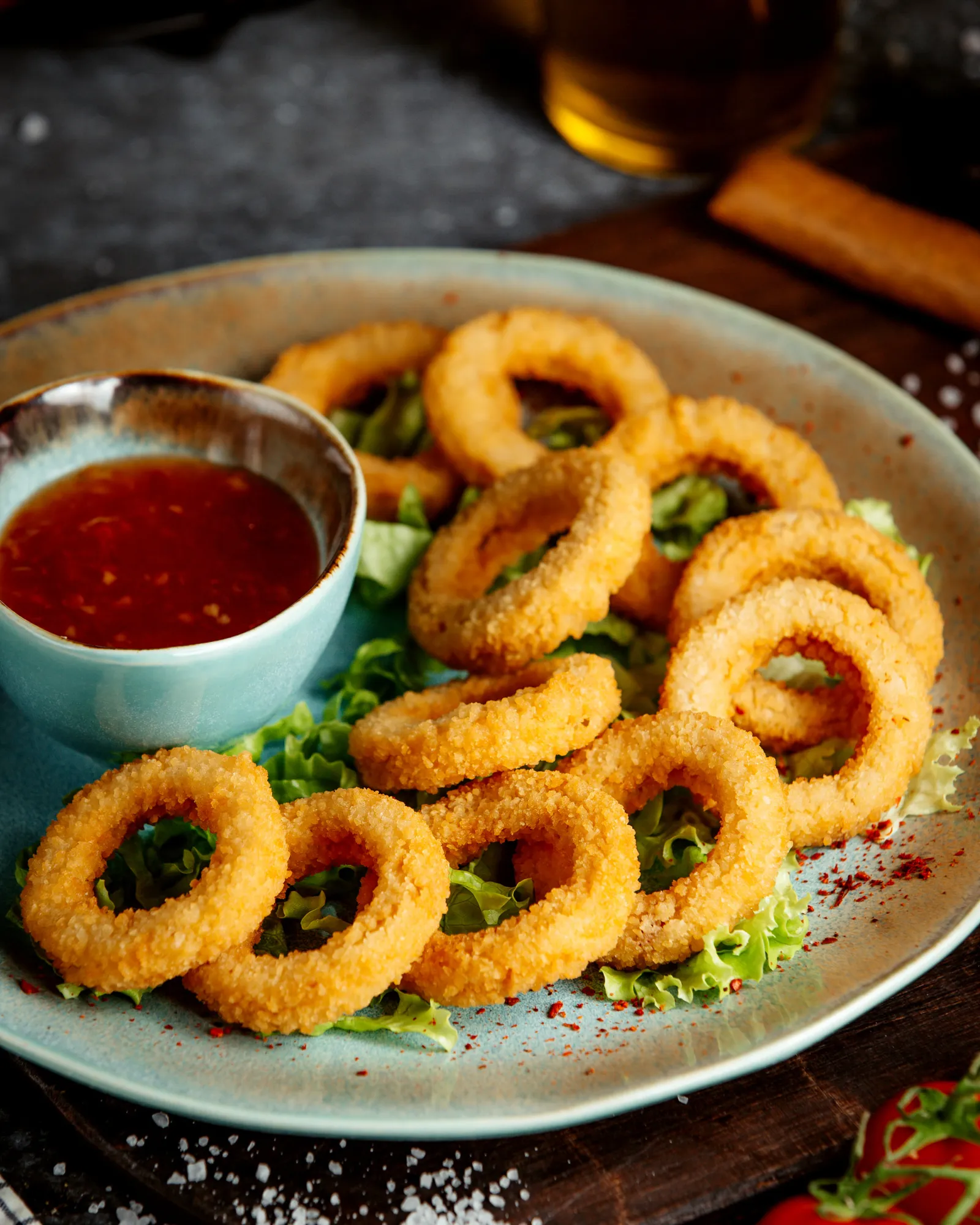 Onion rings served with side of ketchup at meat and eat.
