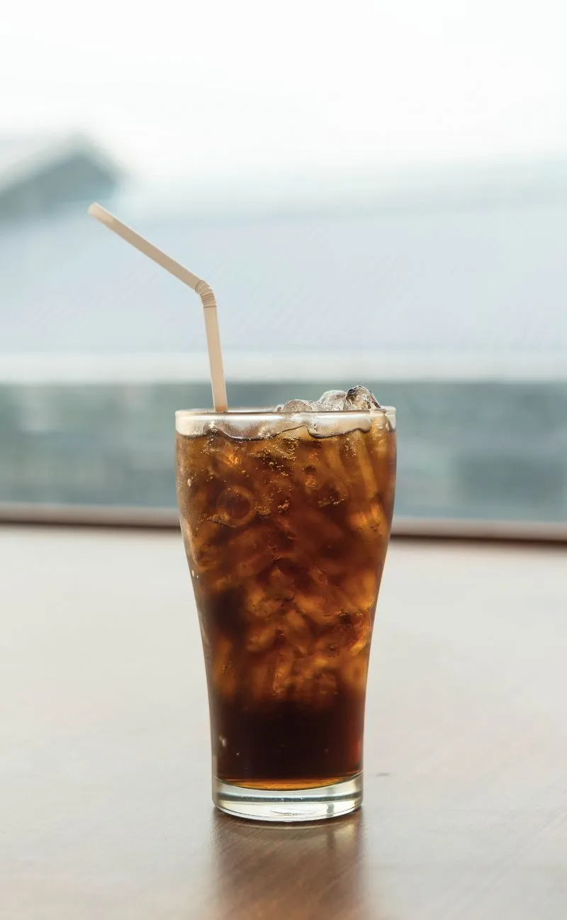 Refreshing cold coffee served in glass cup.