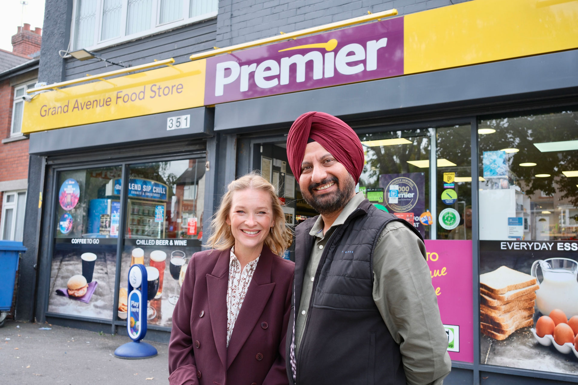 Joanna Page and Kuljit Athwal outside Premier Grand Avenue Food Store in Cardiff