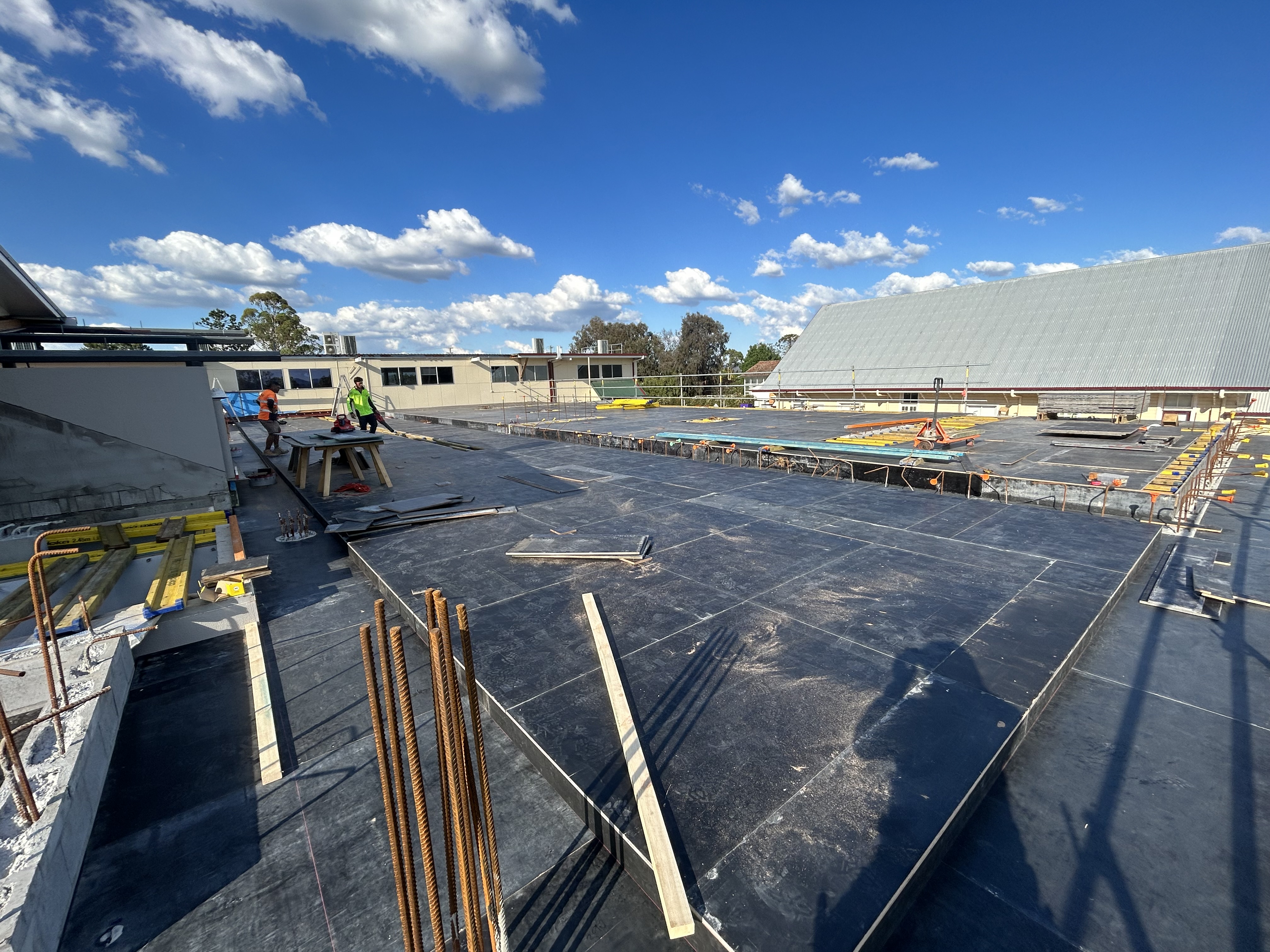 D&T Construction Group team working on a construction project in progress