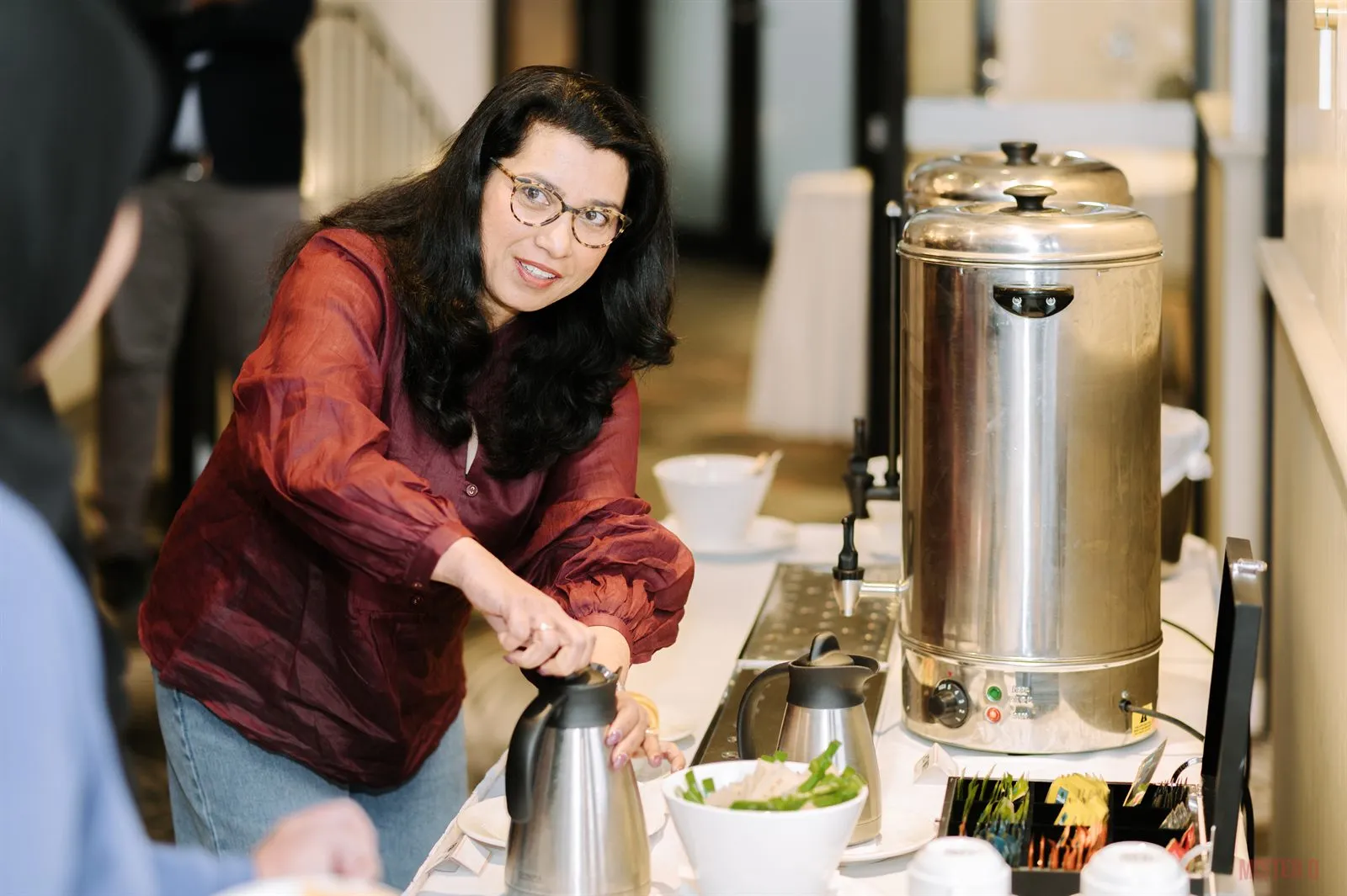 An attendee pours coffee during the morning break at SALA CPD Day 2025