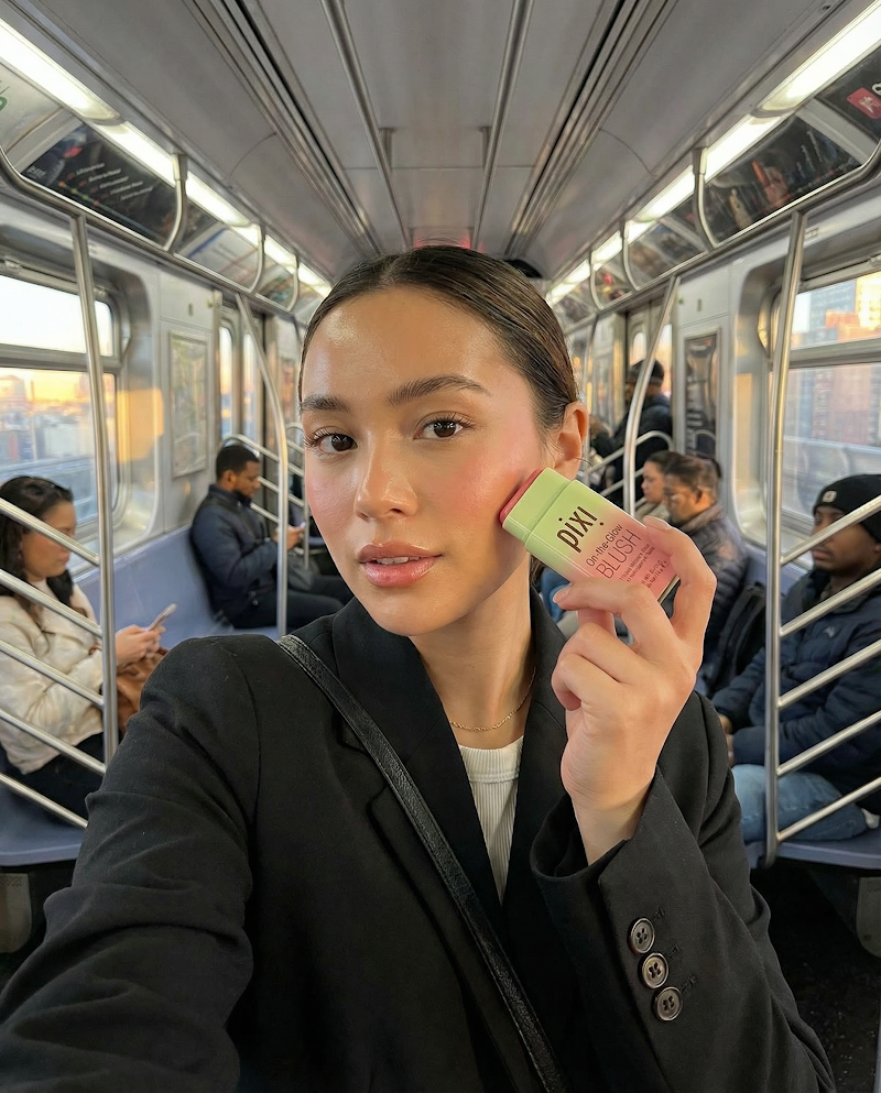 UGC beauty applying on the go