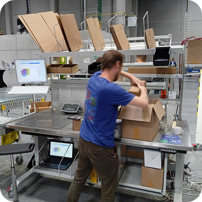 Cartonization at warehouse packing station