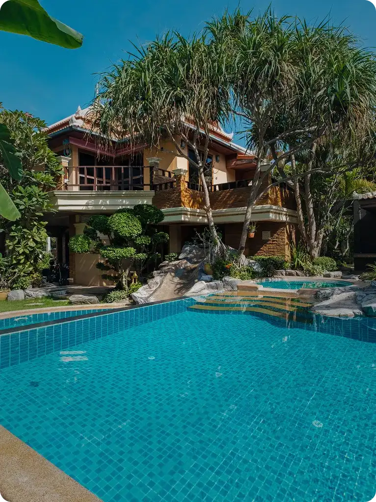 The scene evokes a luxurious and serene vacation or residential setting, ideal for showcasing tropical real estate, luxury travel, or resort amenities.